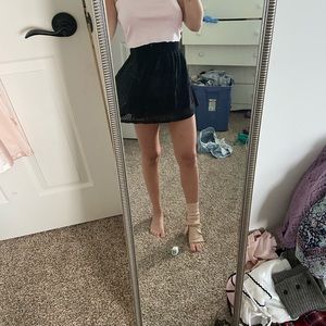 Short black lacey skirt